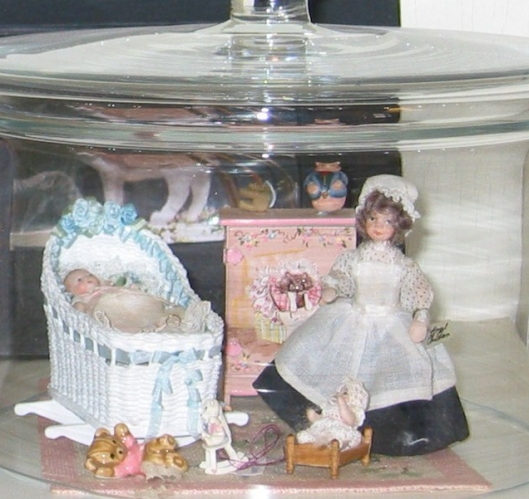 Nanny, Baby in her Bassinet under Glass Dome